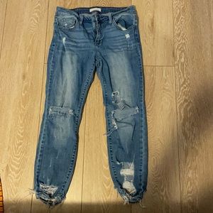 Ripped blue jeans, size 9